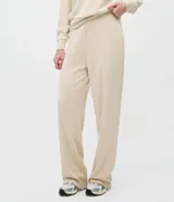 Pantalón de corte recto y cintura alta, confeccionado en una mezcla de poliéster, viscosa y elastano. Presenta una caída fluida y un acabado liso, ideal para un estilo sofisticado y cómodo.