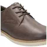 Zapato casual Hush Puppies modelo Bolo, confeccionado en cuero color marrón oscuro. Presenta cierre con cordones, suela de EVA flexible y diseño estilizado con costuras visibles en el borde de la suela.