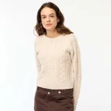 Sweater de punto con diseño trenzado, cuello redondo y mangas largas, de calce holgado y acabado texturizado.
