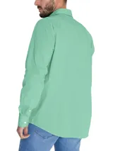 Camisa de manga larga de algodón orgánico color verde menta RKF, con cuello italiano y logo bordado en el pecho.