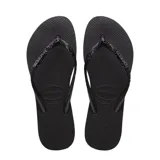 Sandalias tipo ojota Havaianas modelo Slim Glitter II, color negro, con tiras finas decoradas con glitter brillante y logo de la marca en relieve.