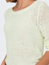 Sweater de punto con cuello redondo y manga larga, de corte regular y textura suave.