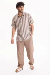Pantalón de lino con cintura elastizada y cordón ajustable