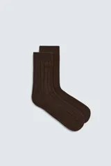 Calcetines de lana con diseño acanalado y acabado en rib.