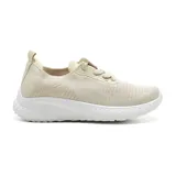 Championes deportivos American Sport color beige con detalles en rosa y suela blanca.