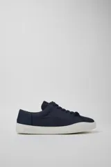 Zapatillas Camper modelo Touring Ry.881, de color azul marino con suela blanca de goma. Presentan diseño de lona, cierre con cordones y costuras reforzadas.