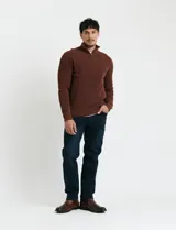 Remera de punto de algodón con cuello alto y cierre frontal parcial, de manga larga y diseño de punto inglés.