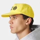 Gorra amarilla con visera curva, confeccionada en algodón. Cuenta con bordado frontal con el texto "EMEST ALWAYS" y un escudo distintivo en negro.