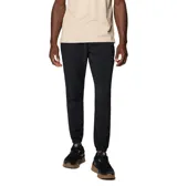 Pantalón tipo jogger de color negro, con cintura elástica ajustable mediante cordón, bolsillos delanteros y bolsillo trasero con cremallera. Presenta dobladillos elásticos en los tobillos y detalles reflectantes, confeccionado con tecnología Omni-Shield resistente al agua y a las manchas.