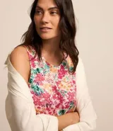 Vestido corto sin mangas confeccionado en viscosa con cuello redondo y flores estampadas en estilo liberty.