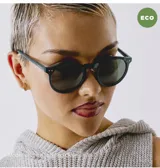 Lentes de sol unisex con montura redonda color verde oscuro y lentes polarizadas color verde oscuro.