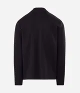 Remera térmica de manga larga y cuello alto tipo mock neck, color marrón, confeccionada en tejido de poliéster, algodón y elastano.