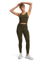 Musculosa deportiva Under Armour de la línea Vanish, confeccionada con tejido sin costuras, de ajuste al cuerpo y diseño bicolor. Presenta escote redondo y logo de la marca en el centro del pecho.