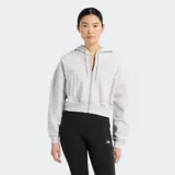 Campera con capucha y cierre completo, color gris melange, confeccionada en tejido de rizo francés de algodón. Presenta un corte corto (cropped) y un ajuste holgado, con sutiles detalles de canalé en los hombros y las mangas, y un pequeño logo bordado tonal en el pecho.