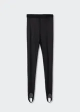 Leggings de encaje con diseño fuseau, confeccionados en tejido elástico semitransparente con patrón geométrico. Presentan un corte entallado y cintura elástica.