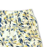 Short de baño con estampado botánico de hojas en tonos azules y verdes sobre fondo blanco. Cuenta con cintura elástica con cordón ajustable, tres bolsillos y malla interior hipoalergénica.