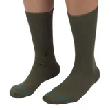 Medias Stance Icon color verde con logo bordado en el tobillo y banda azul en el arco del pie.