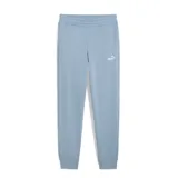 Pantalón de jogging Puma para mujer, color celeste, con cintura elástica y puños en los tobillos. Presenta el logo de la marca bordado en blanco en la pierna izquierda.