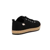 Zapatillas acordonadas Moleca modelo Gacela, color mostaza con suela marrón con diseño trenzado.