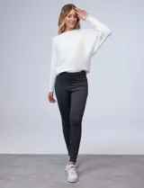 Legging elastizada azul oscuro, marca Alex & Jordan. Pretina ancha con faja interna moldeadora.