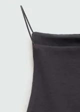 Top entallado de cuello halter con diseño recto y tirantes finos, confeccionado en tejido de mezcla de algodón.