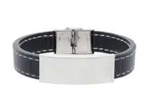 Pulsera de cuero negro con costuras blancas y chapa de acero inoxidable para grabar.