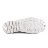 Botas de caña alta color beige, marca Palladium, modelo Pampa Hi. Confeccionadas en lona de algodón con suela de goma blanca.