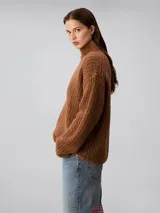 Sweater Calvin Klein de tejido de punto y lana suave cepillada, color marrón, con cuello alto, manga larga y corte regular.