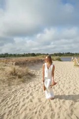 Conjunto de chaleco con botones y pantalón palazzo de crepé color negro.