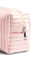 Neceser de poliéster color rosado pálido con rayas verticales en blanco.