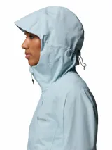 Campera cortaviento e impermeable Columbia Trailborne 2.5L en color celeste, con capucha integrada, cierre frontal bidireccional, bolsillos con cierre y tecnología Omni-Tech.