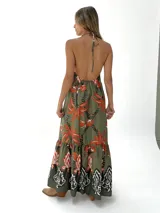 Vestido largo de algodón italiano con estampado floral, escote en V, espalda descubierta con elástico y tiras para atar al cuello.
