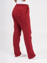 Pantalón deportivo azul petróleo, de corte recto y tiro alto, con cintura elástica ajustable con cordón.