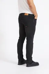 Pantalón jeans Quiksilver modelo RIN para hombre, de corte slim y color negro gastado, con bolsillos clásicos y cierre frontal de botón y cremallera.