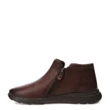 Botas cortas de cuero color marrón, con diseño tipo botineta, cierre lateral y detalle de textura en el borde superior. Poseen una suela de goma flexible y cómoda.