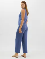 Pantalón tejido de corte recto y diseño fluido, color amarillo, con cintura ancha elastizada.