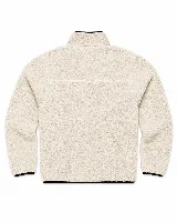 Campera de sherpa color marrón con cierre frontal, cuello alto y bolsillo en el pecho con cierre. Presenta detalles en color azul marino en los bordes y cierres, y un parche decorativo en el bolsillo superior.