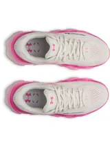 Championes Under Armour modelo W HB Runner 2, de color beige con detalles en fucsia, diseño con suela chunky y capellada de malla transpirable.