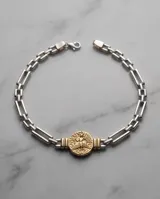 Pulsera de eslabones de plata con medalla central dorada con relieve del Espíritu Santo.