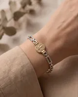 Pulsera de eslabones de plata con medalla central dorada con relieve del Espíritu Santo.