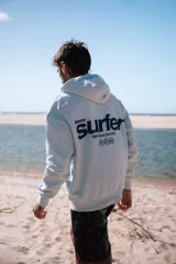 Hoodie celestes con capucha, corte oversize y estampa frontal y trasera con la leyenda "Glassy Surfer Ride Your Own Wave".