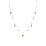 Collar de plata 925 con dijes de piedra peridoto en forma de gota y dijes de estrella.