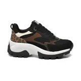 Champion deportivo Via Marte modelo Sora, con diseño de suela chunky dentada. Presenta una combinación de colores negro, marrón y detalles en animal print de leopardo en el talón, con paneles de malla y materiales sintéticos.