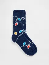 Medias de textura suave y afelpada, color azul marino, con estampado de luces navideñas de colores.
