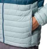 Campera puffer con capucha, diseño color block en tonos azul, gris y amarillo. Cuenta con cierre frontal completo, bolsillos laterales y logo de la marca estampado en el pecho.