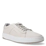 Zapatos urbanos Freeway de estilo casual, confeccionados en nobuk color taupe. Presentan cierre con cordones al tono, suela de goma blanca con detalle en la parte posterior y diseño minimalista con costuras reforzadas.
