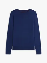 Sweater Tommy Hilfiger de corte regular, confeccionado en mezcla de algodón y lyocell, en color azul marino. Presenta cuello redondo, puños y bajo de punto canalé, y logo bordado en la manga.