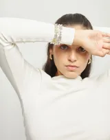 Pulsera de eslabones de aleación de metales bañada en plata de ley y oro de 18k.