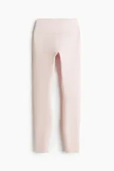 Leggings deportivos de tiro alto en color rosa, confeccionados en tejido funcional DryMove y SoftMove con cintura ancha y soporte firme.
