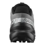 Championes Salomon Speedcross 6 de color negro, diseñados específicamente para trail running. Presentan una estructura robusta y técnica, capellada sintética y textil con refuerzos termosellados, sistema de cordones de ajuste rápido Quicklace y suela con tacos profundos para máxima tracción en terrenos difíciles.